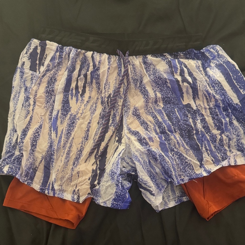 Nike Black and Orange running shorts